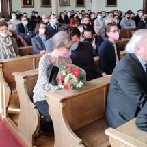 Az ünnepelt hátterében